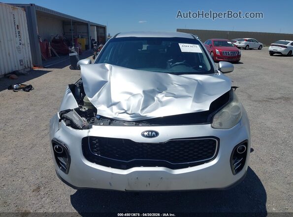 KNDPMCAC7J7381545 2018 KIA SPORTAGE Серебряный Вид задней части салона