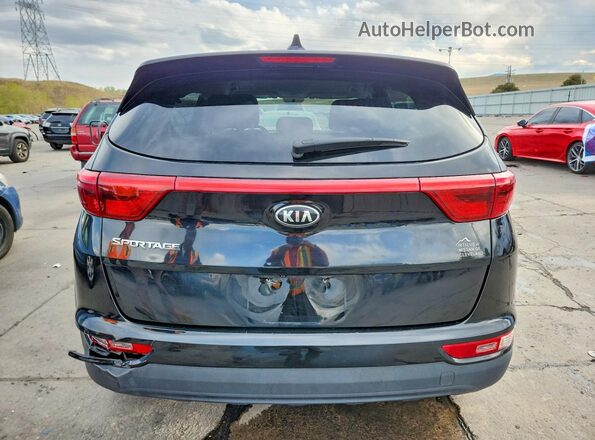 KNDPMCACXJ7306659 2018 KIA SPORTAGE Черный Вид сзади
