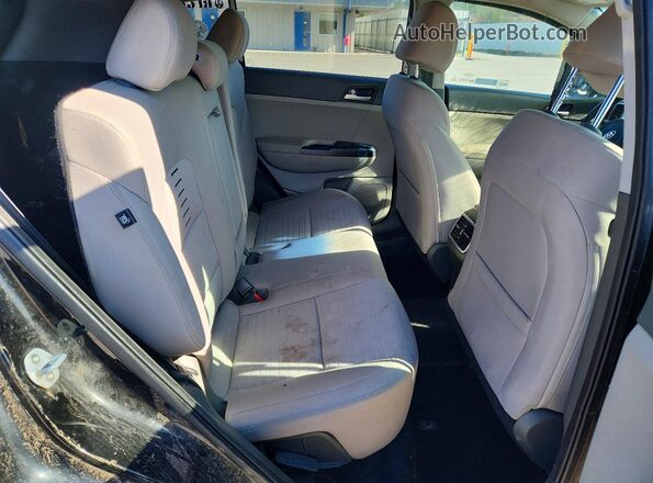 KNDPMCACXK7589923 2019 KIA SPORTAGE Black Vista de los asientos traseros