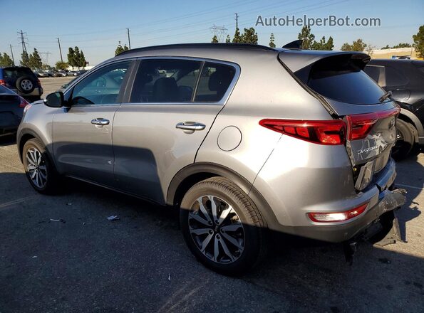 KNDPN3AC3K7613105 2019 KIA SPORTAGE Серебряный Задняя левая четверть