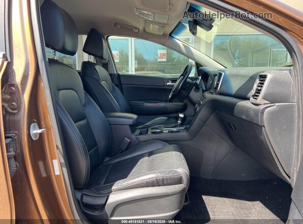 KNDPNCAC2H7032557 2017 KIA SPORTAGE Коричневый Вид салона спереди