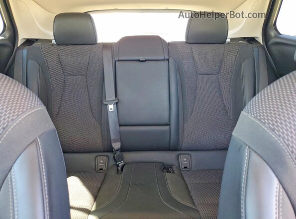 LRBAZLR44PD072838 2023 BUICK ENVISION Black Vista de los asientos traseros