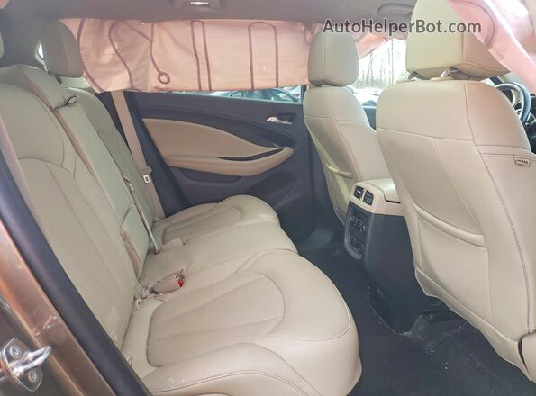 LRBFXBSA4HD151532 2017 BUICK ENVISION Brown Vista de los asientos traseros