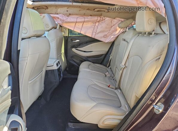LRBFXESX1GD174948 2016 BUICK ENVISION Purple Vista de los asientos traseros