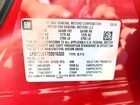 2025 Buick Envision Sport Touring Red vin: LRBFZLE47SD016333