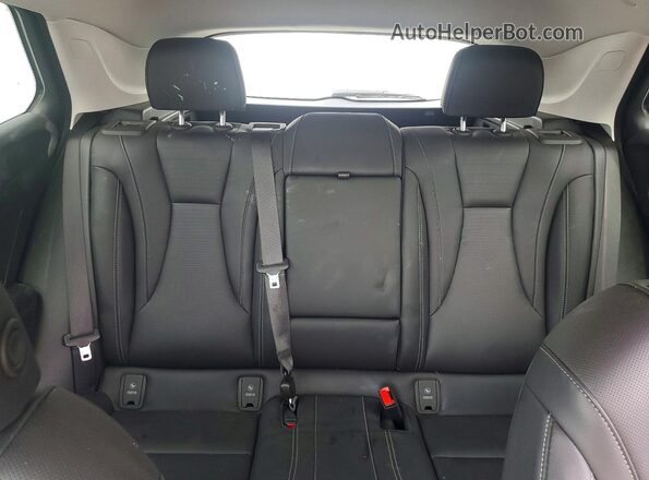 LRBFZME42RD073331 2024 BUICK ENVISION Gray Vista de los asientos traseros