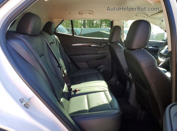 LRBFZME43RD075363 2024 BUICK ENVISION Белый Вид задней части салона
