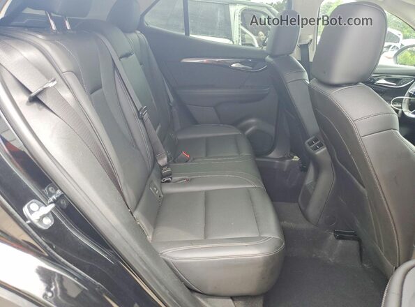 LRBFZME48RD064603 2024 BUICK ENVISION Черный Вид задней части салона