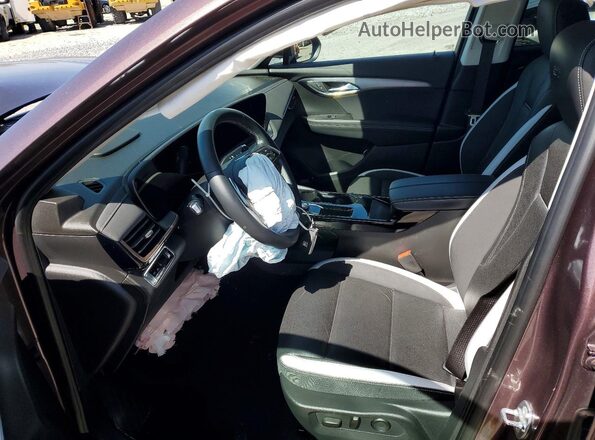 LRBFZPE47RD016723 2024 BUICK ENVISION Brown Vista interior delantera