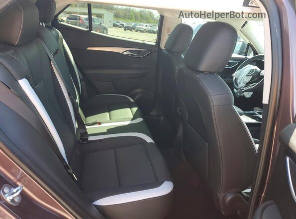 LRBFZPE47RD016723 2024 BUICK ENVISION Brown Vista de los asientos traseros