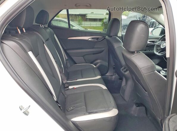 LRBFZPE49RD044832 2024 BUICK ENVISION Белый Вид задней части салона