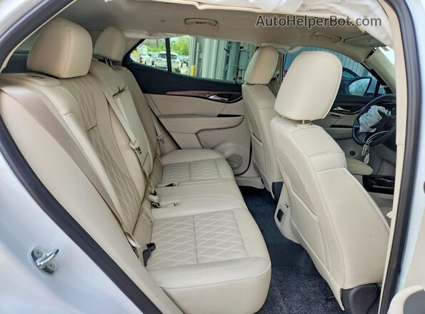 LRBFZSR47PD155678 2023 BUICK ENVISION White Vista interior trasera