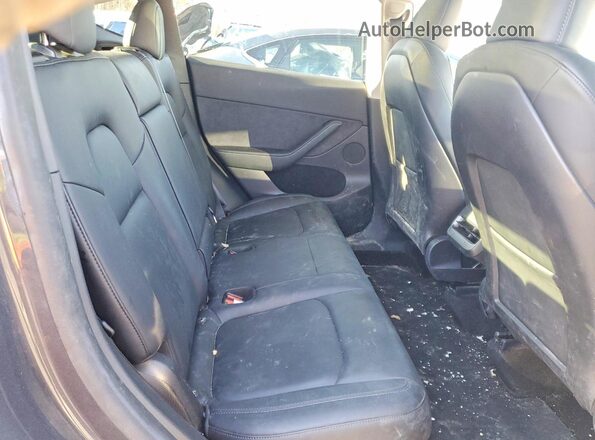 LRWYGDFD5PC071930 2023 TESLA MODEL Gray Vista de los asientos traseros