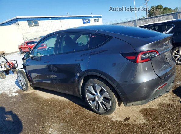 LRWYGDFD5PC071930 2023 TESLA MODEL Gray Trasero izquierdo