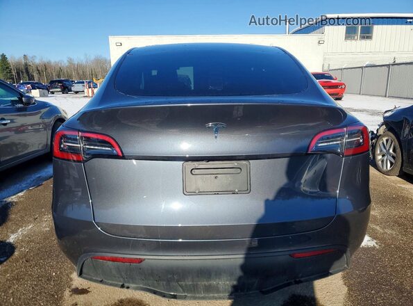 LRWYGDFD5PC071930 2023 TESLA MODEL Gray Vista trasera