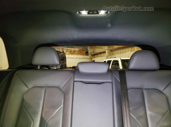 WA1AECF37L1025866 2020 AUDI Q3 Black Vista de los asientos traseros