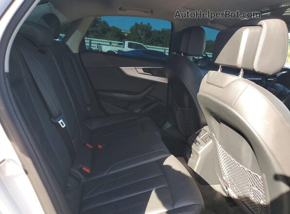WAUGNAF48HN020296 2017 AUDI A4 White Vista de los asientos traseros