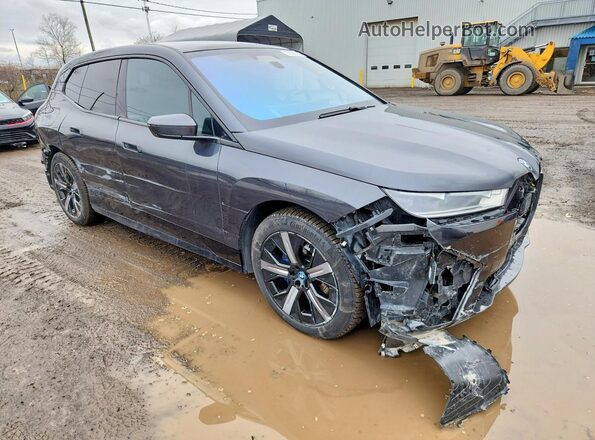 WB513CF06PCL80129 2023 BMW IX Black Delantero derecho
