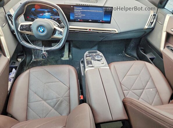 WB513CF06PCL80129 2023 BMW IX Black Vista del salpicadero