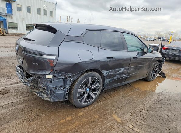 WB513CF06PCL80129 2023 BMW IX Black Trasero derecho