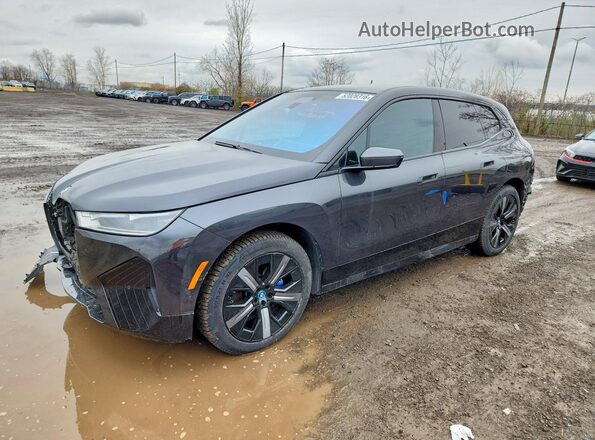 WB513CF06PCL80129 2023 BMW IX Black Vista tres cuartos delantera izquierda
