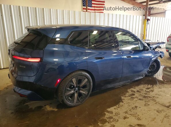 WB523CF00SCU53668 2025 BMW IX Blue Trasero derecho