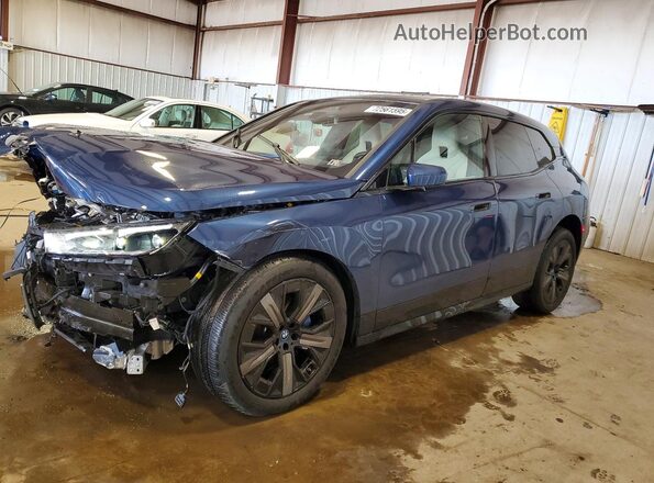 WB523CF00SCU53668 2025 BMW IX Blue Vista tres cuartos delantera izquierda