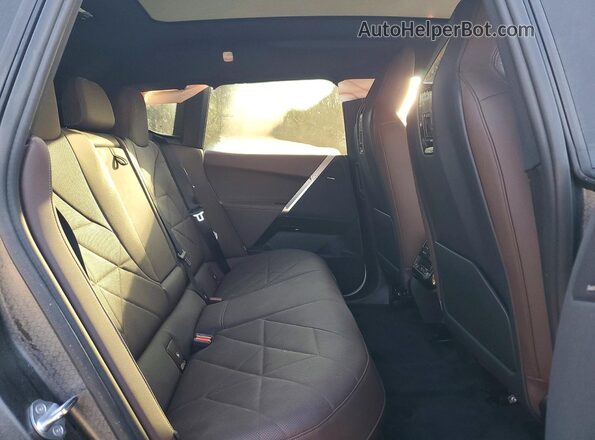 WB523CF06PCM41127 2023 BMW IX White Vista de los asientos traseros