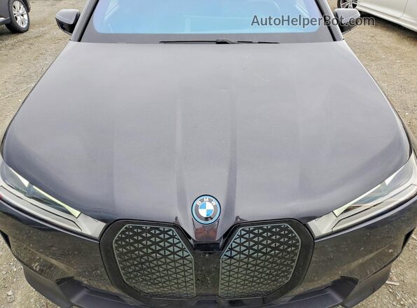 WB523CF0XPCM76012 2023 BMW IX Black Widok wnętrza z tyłu