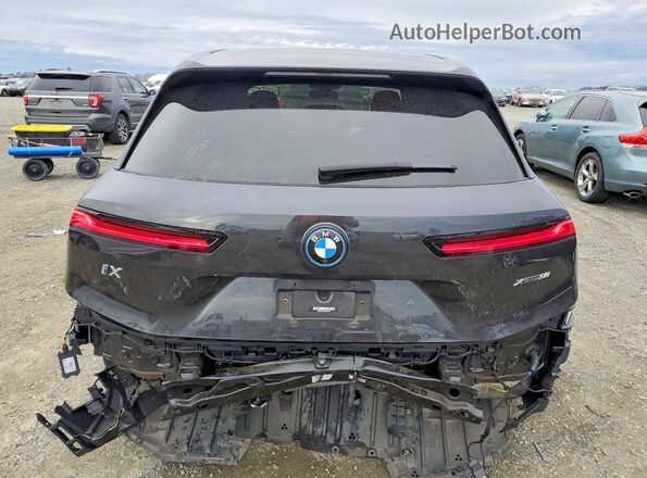 WB523CF0XPCM76012 2023 BMW IX Black Widok z tyłu
