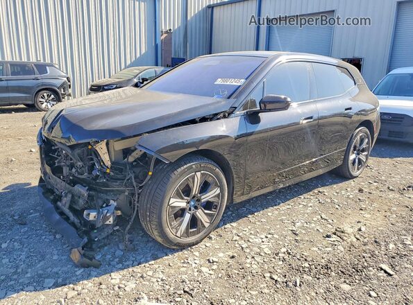 WB523CF0XPCM90881 2023 BMW IX Black წინა მარცხენა ხედი სამი მეოთხედიდან