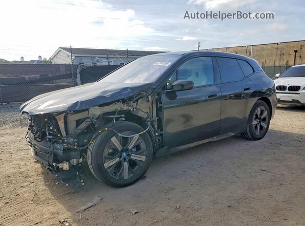 WB523CF0XRCR75945 2024 BMW IX Black Vista tres cuartos delantera izquierda