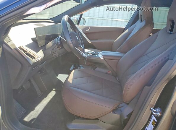WB543CF06TCV37620 2026 BMW IX Black Vista interior delantera