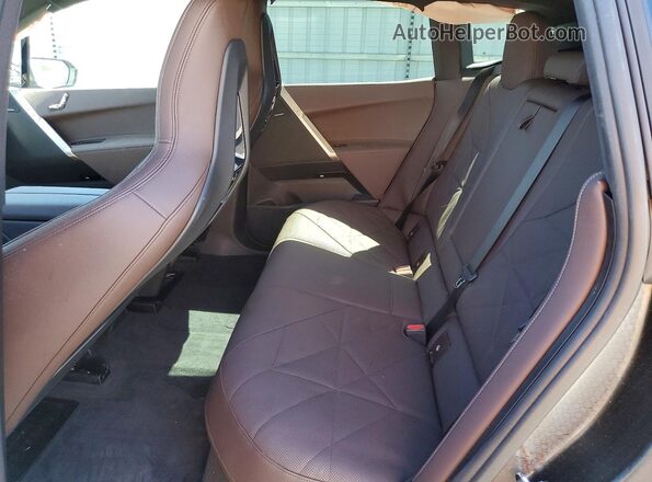 WB543CF06TCV37620 2026 BMW IX Black Vista interior trasera