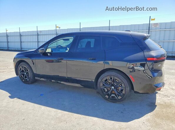 WB543CF06TCV37620 2026 BMW IX Black Trasero izquierdo