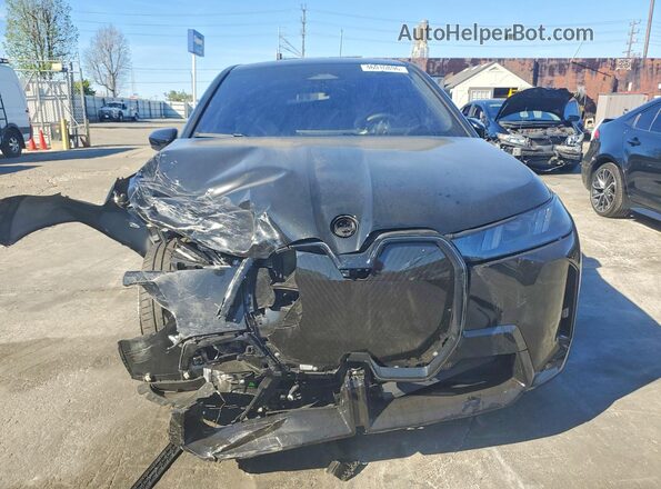 WB543CF08TCW71917 2026 BMW IX Black Vista frontal