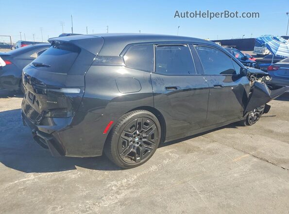 WB543CF08TCW71917 2026 BMW IX Black Trasero derecho