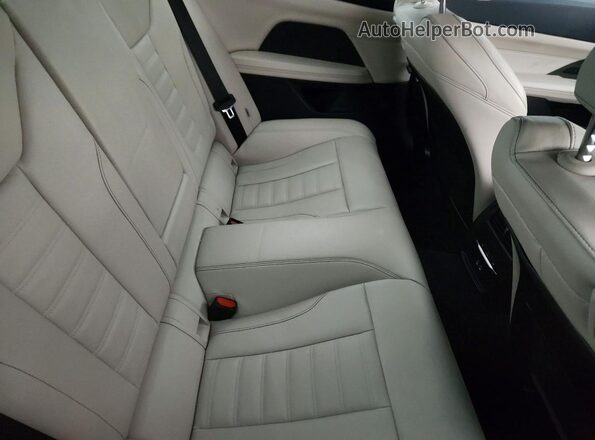 WBA13AR05MCF44163 2021 BMW M4 Gray Vista de los asientos traseros