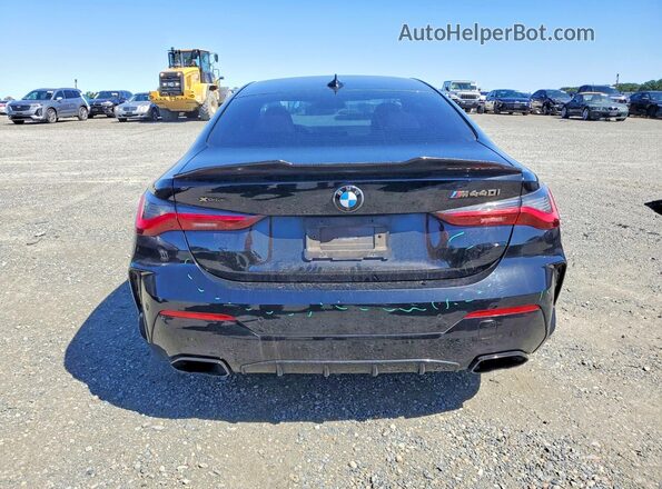 WBA13AR06MCF94151 2021 BMW M4 Black Vista trasera