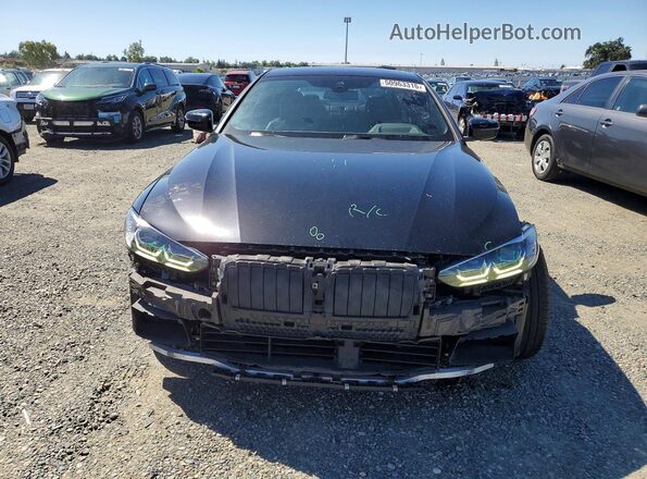 WBA13AR06MCF94151 2021 BMW M4 Black Vista frontal