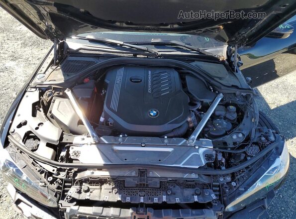 WBA13AR06MCF94151 2021 BMW M4 Black Vista interior trasera