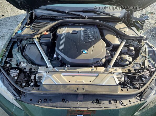 WBA13AW09NFN20689 2022 BMW M4 Green Widok wnętrza z tyłu