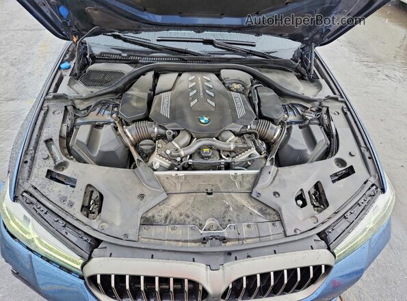 WBA13BK02PCL36839 2023 BMW M5 Blue Vista interior trasera