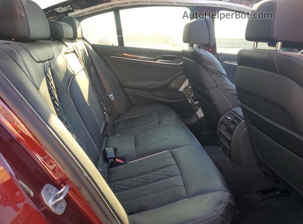 WBA13BK0XPCM10329 2023 BMW M5 Red Vista de los asientos traseros
