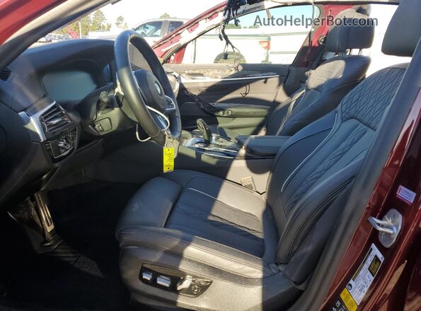 WBA13BK0XPCM10329 2023 BMW M5 Red Vista interior delantera