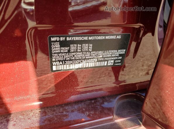 WBA13BK0XPCM10329 2023 BMW M5 Red Vista del compartimento del motor