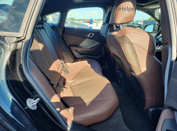 WBA33GG02T7U42743 2026 BMW M2 Black Vista de los asientos traseros