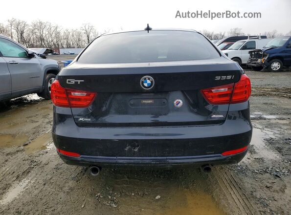 WBA3X9C5XGD869970 2016 BMW OTHER Black Rear view