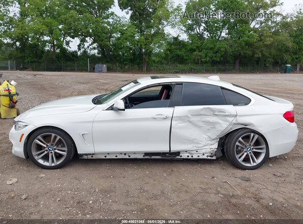 WBA4A9C55GGL89288 2016 BMW OTHER White Вид задньої частини салону
