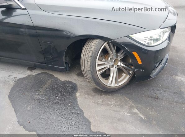 WBA4A9C58GG507771 2016 BMW OTHER Черный Вид спереди